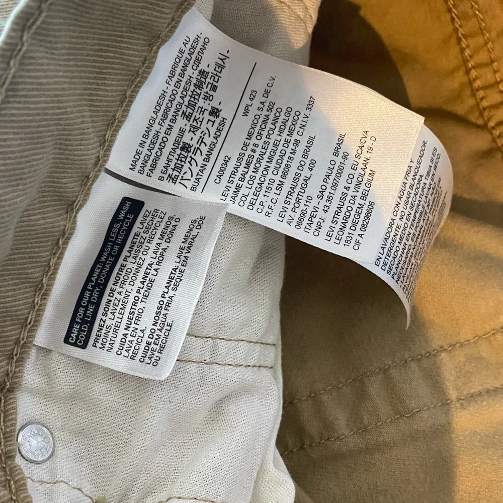 Levi's 502 tan pants. Size 36. HEMMED‎